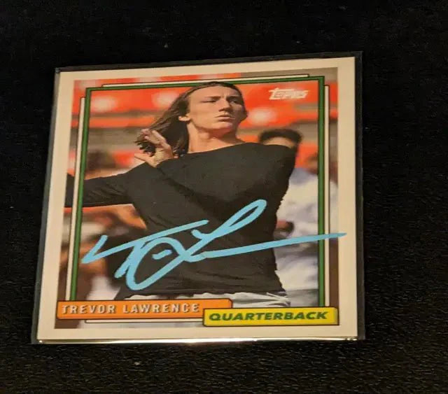 A Trevor Lawrence autographed card w/ COA
