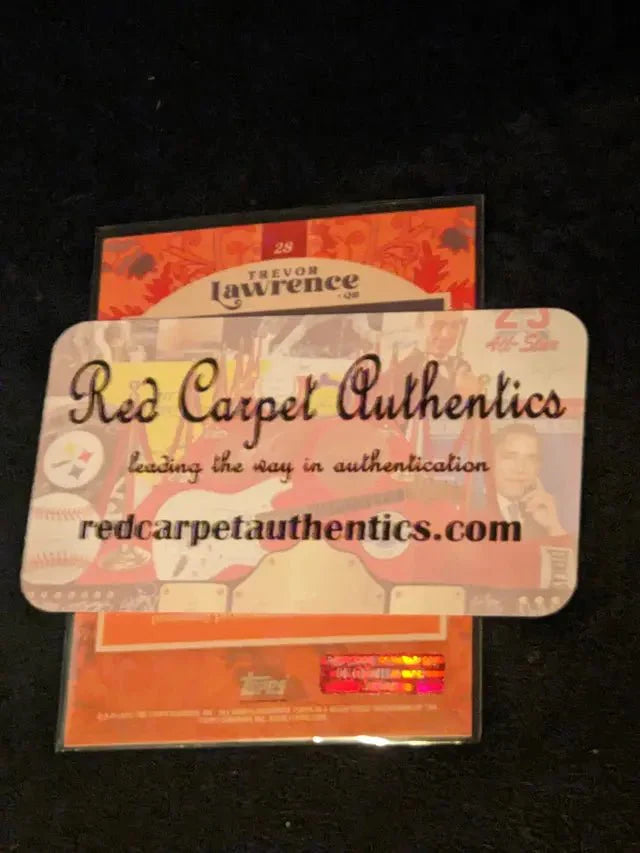 A Trevor Lawrence autographed card w/ COA